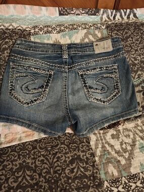Silver Jeans Distressed Medium Blue Denim Shorties